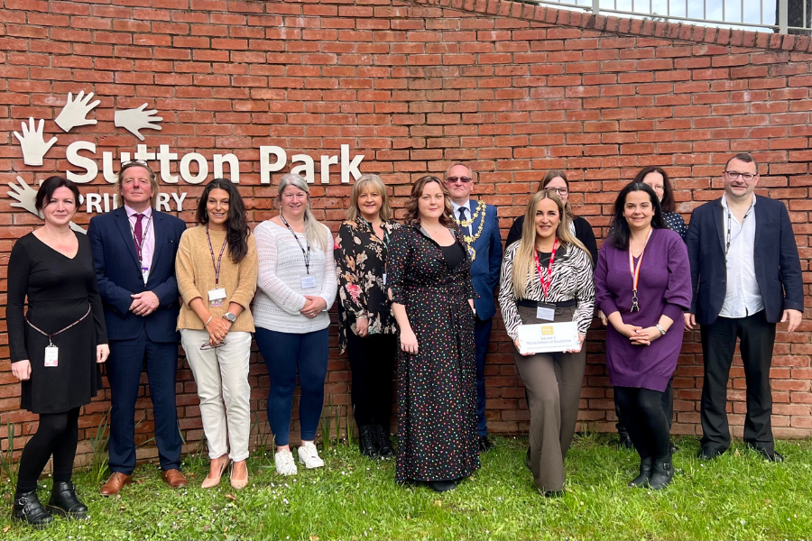 The team at Sutton Park Primary School receiving their Thrive School of Excellence award